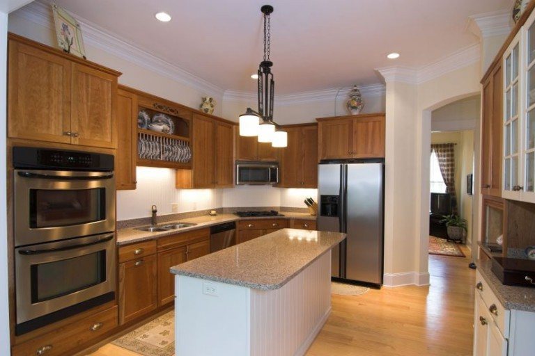 Kitchen with island and stainless steel appliances